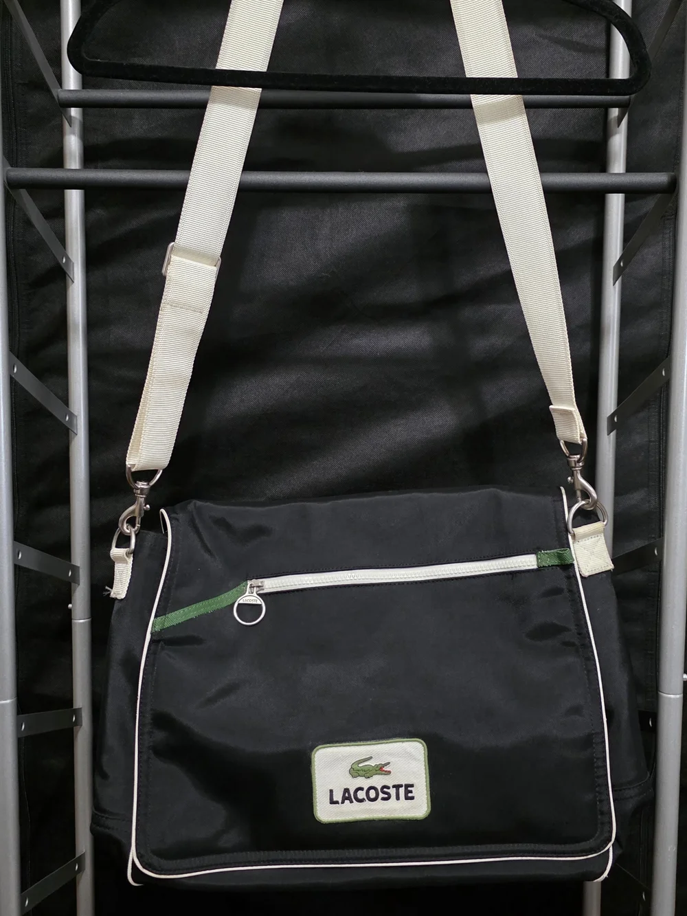 Lacoste Black Messenger Bag with Cream Strap and Green Accent